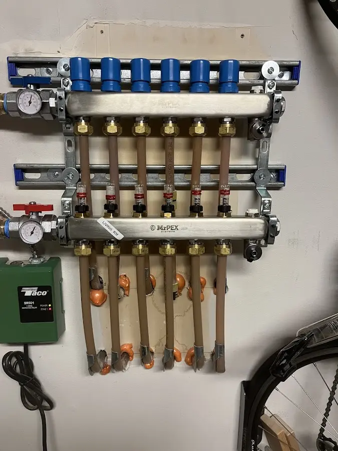 Plumber performing Gas Leak Detection at a residential property in Le Mars